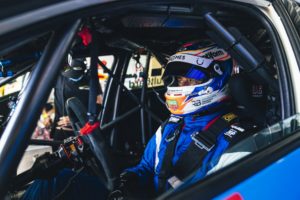Race Car Driver Behind Wheel — Fabian Coulthard